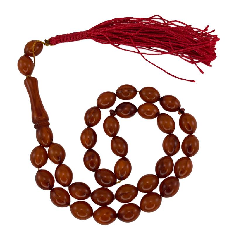 تسبیح پودر کهربا 33 دانه قهوه ای کدTA3 1 تسبیح پودر کهربا 33 دانه قرمز با مهره ۱۳ میل و کیفیت بالا