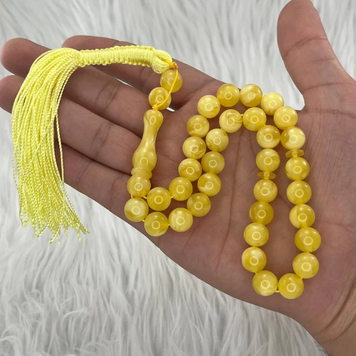 تسبیح پودر کهربا 33 دانه گرد ابروبادی کد TA9 2 تسبیح پودر کهربا 33 دانه گرد ابروبادی