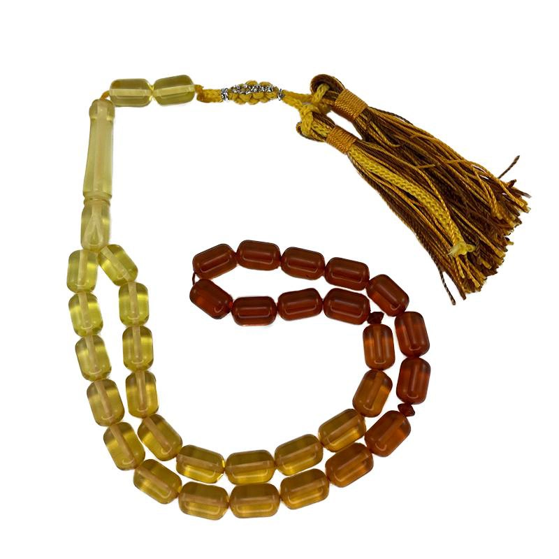 تسبیح پودر کهربا 33 دانه تراش کپسولی دو رنگ کدTA7 1 تسبیح پودر کهربا 33 دانه تراش کپسولی دو رنگ