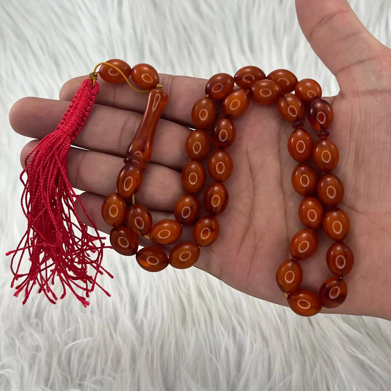 تسبیح پودر کهربا 33 دانه قهوه ای کدTA3 2 تسبیح پودر کهربا 33 با مهره ۱۳ میل و کیفیت بالا